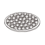 マシュマロをピザ生地の上におき、その周りにチョコレートとくるみをトッピングします。